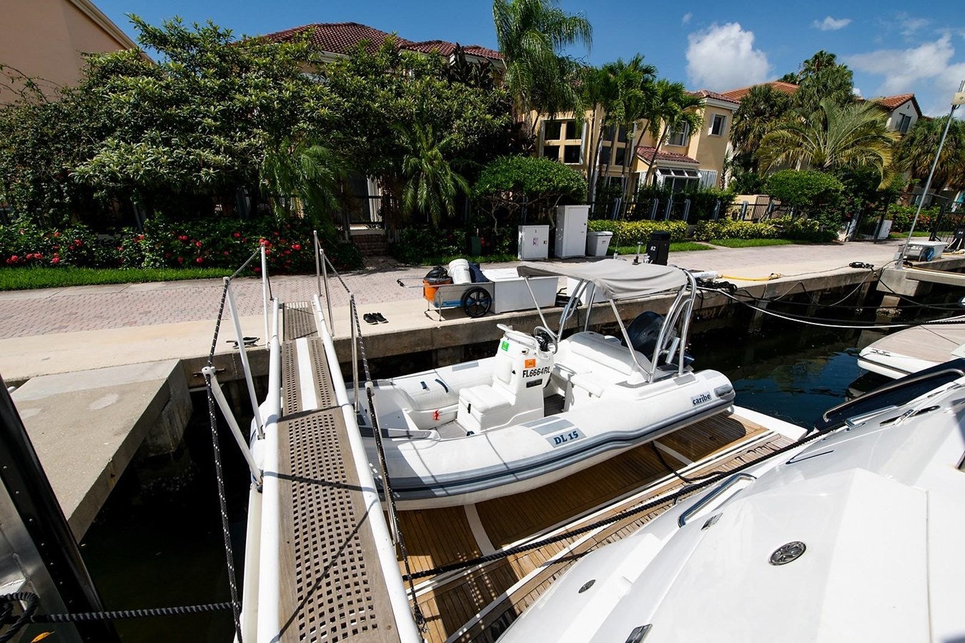 a group of boats are parked in a harbor aboard 82 SUNSEEKER MANHATTAN  Yacht for Sale