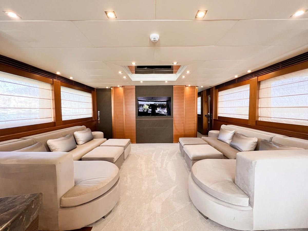 a room with couches and a television aboard MATSU Yacht for Sale