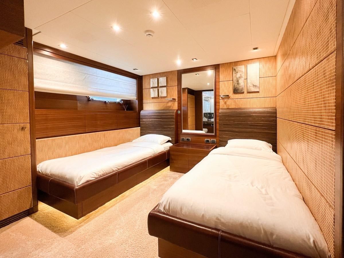 a room with a couple of beds aboard MATSU Yacht for Sale