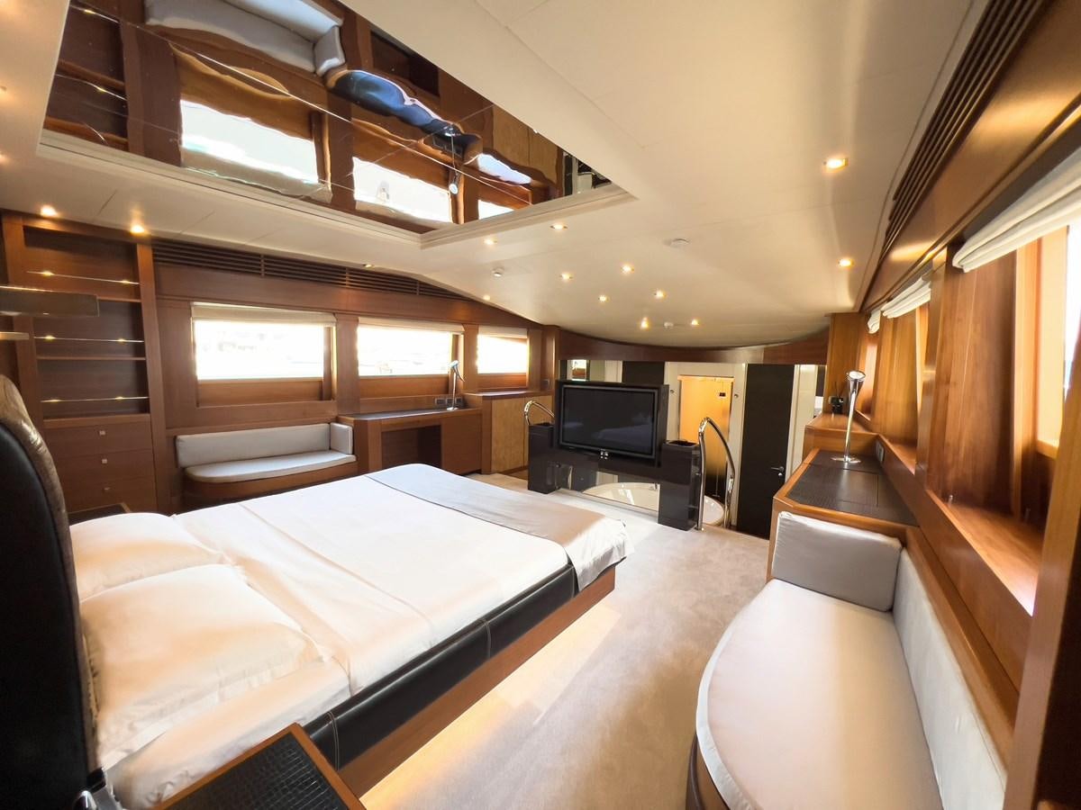 a room with a bed and a tv aboard MATSU Yacht for Sale