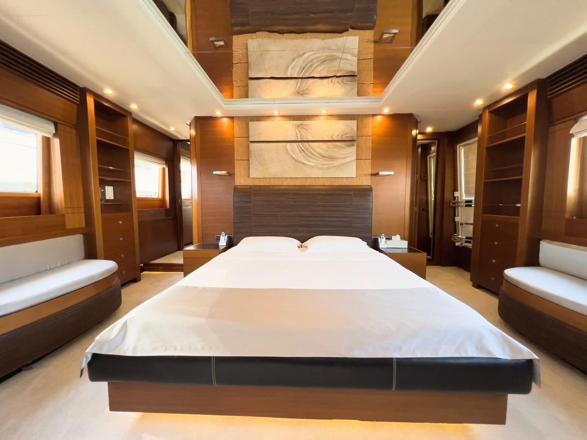 a large bed in a room aboard MATSU Yacht for Sale