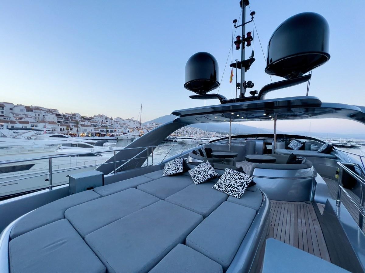 a deck of a boat with a satellite dish and a view of the city aboard MATSU Yacht for Sale