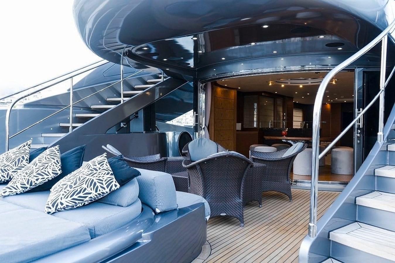 a boat with a deck and chairs aboard MATSU Yacht for Sale