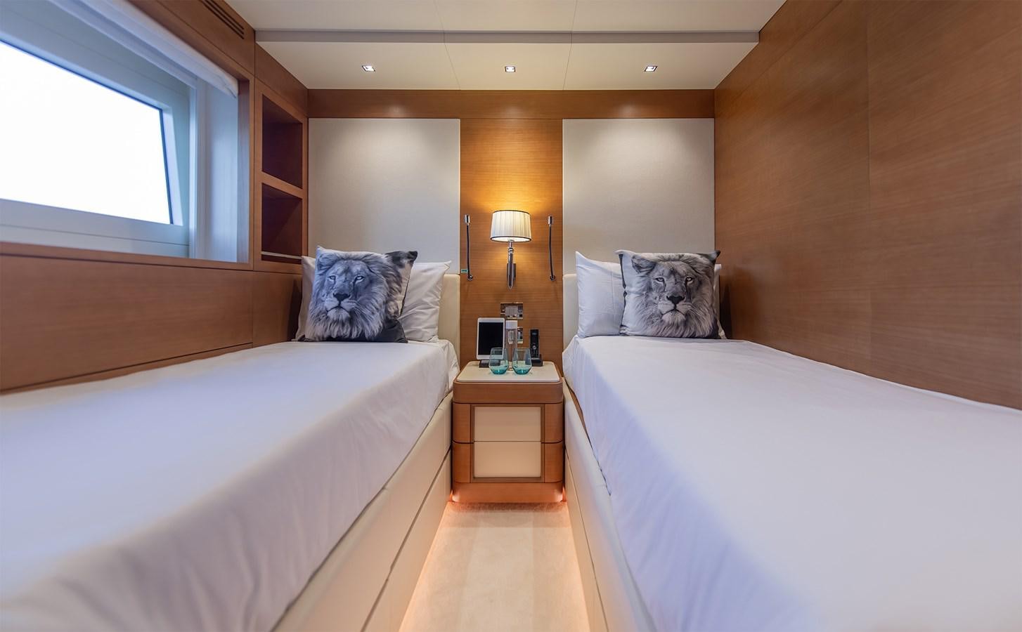 a room with two beds aboard ASLAN Yacht for Sale