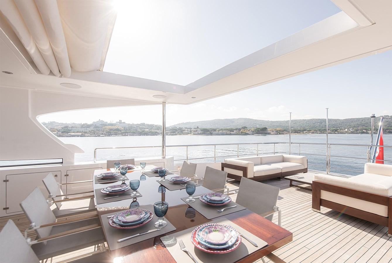 a large living room with a large balcony aboard ASLAN Yacht for Sale