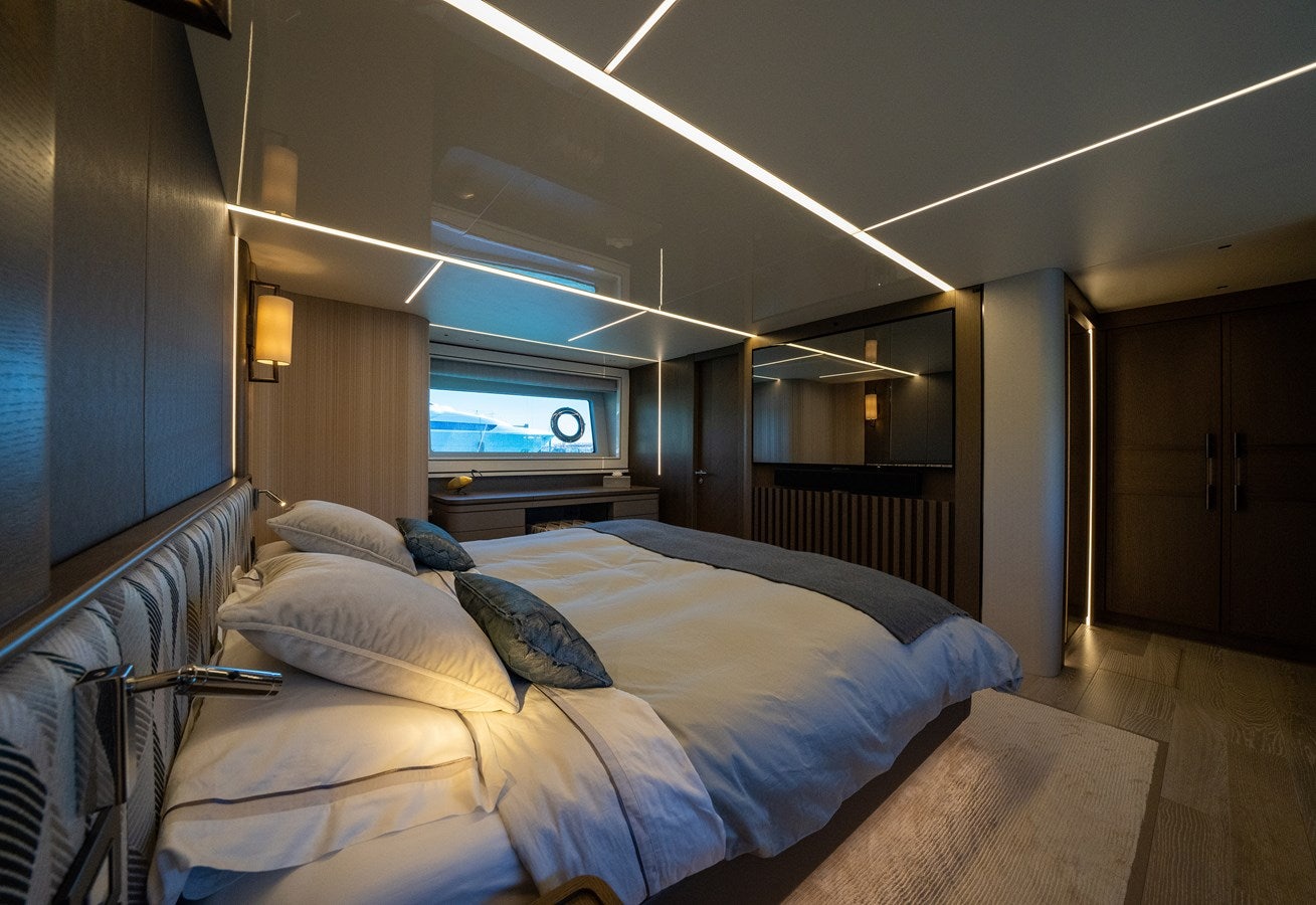 a room with two beds aboard BANDAZUL Yacht for Sale