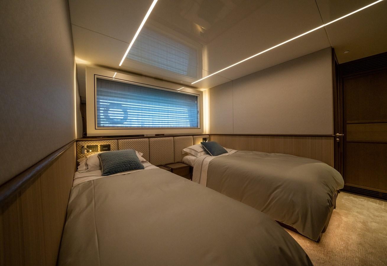 a room with two beds aboard BANDAZUL Yacht for Sale
