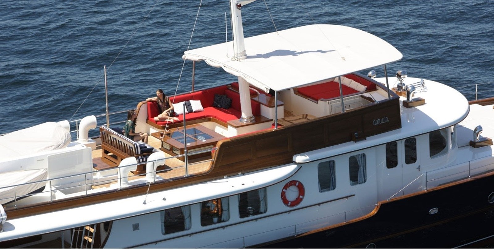 a boat with a white sail aboard DARWIN Yacht for Sale
