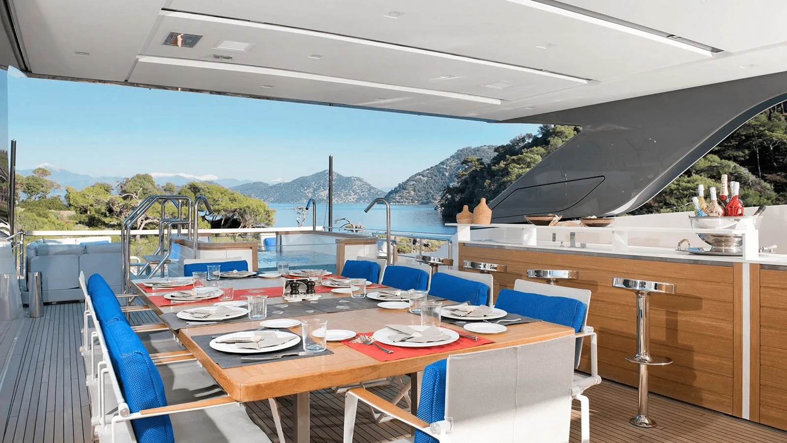 a table set for a meal aboard 2018 SANLORENZO SL118 #614 Yacht for Sale