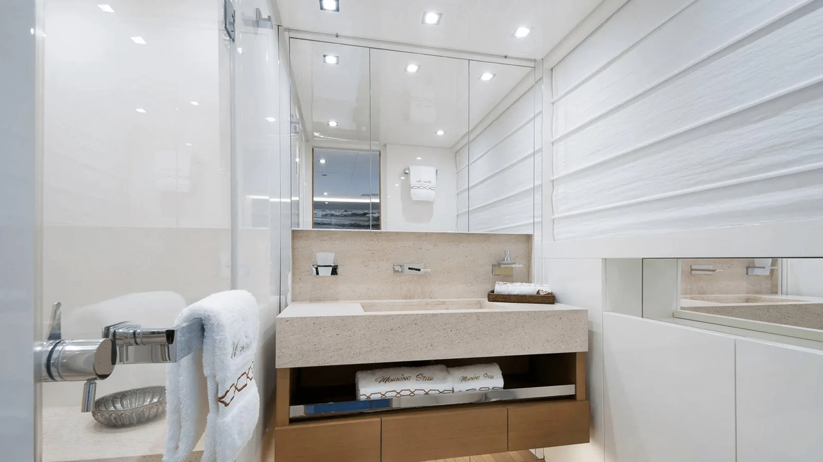 a bathroom with a sink and a mirror aboard 2018 SANLORENZO SL118 #614 Yacht for Sale