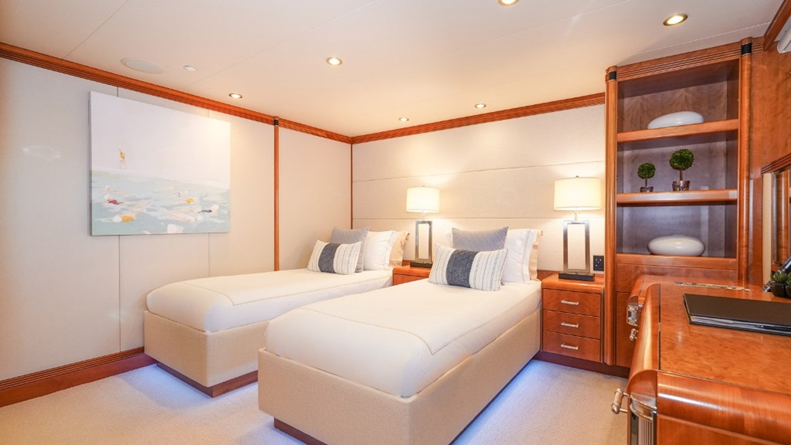 a room with a bed and a desk aboard SEA CLASS Yacht for Sale