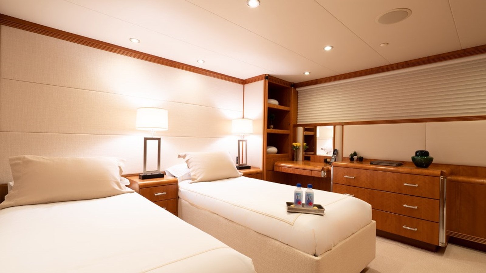 a room with a bed and a desk aboard SEA CLASS Yacht for Sale