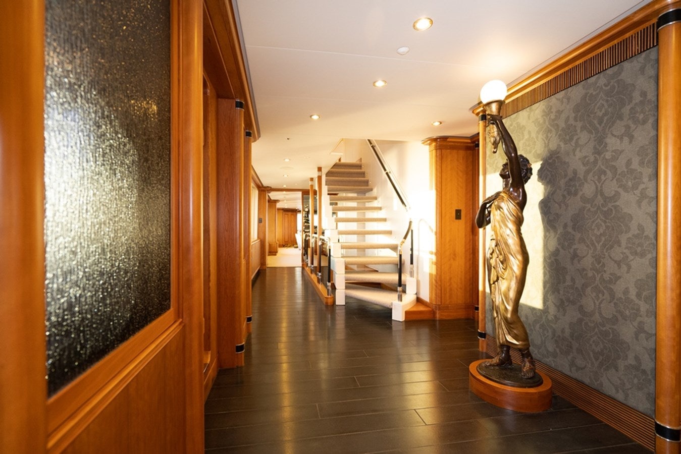 a room with a statue aboard SEA CLASS Yacht for Sale