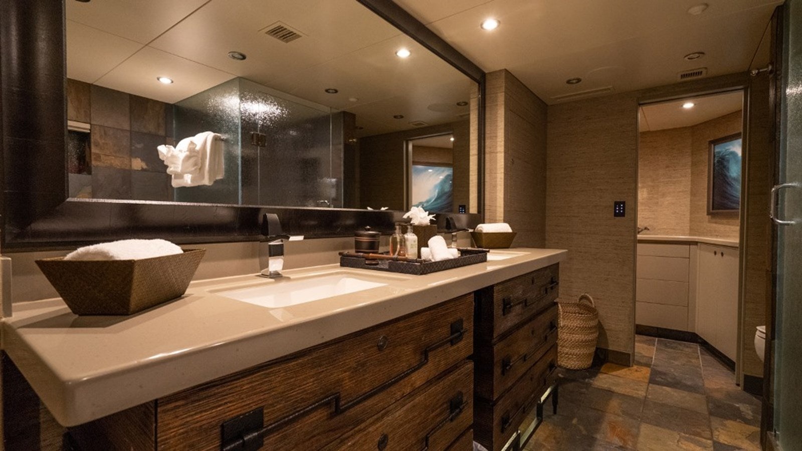 a bathroom with a large mirror aboard SEA CLASS Yacht for Sale