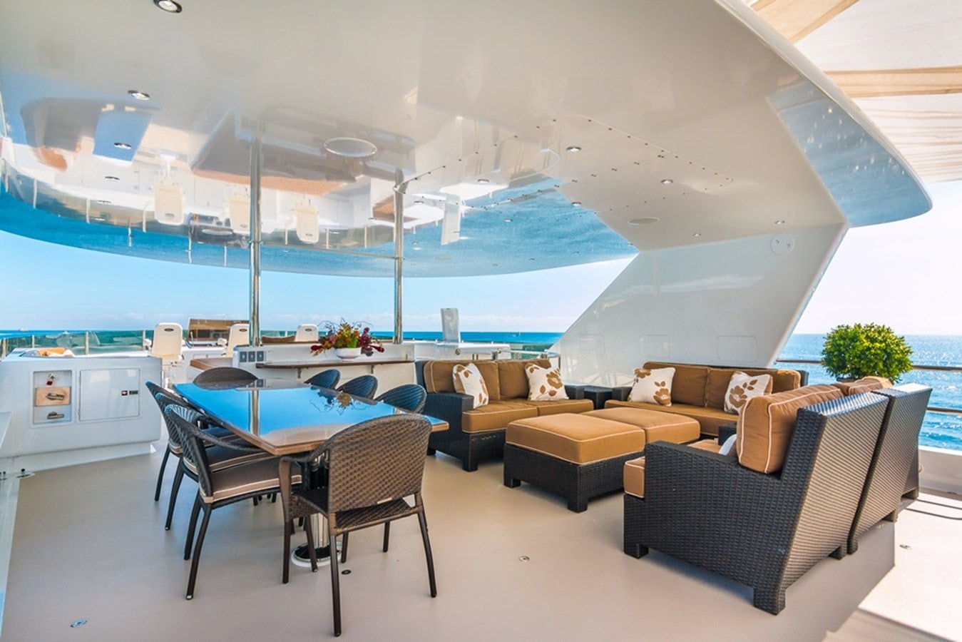 a room with a table and chairs aboard SEA CLASS Yacht for Sale