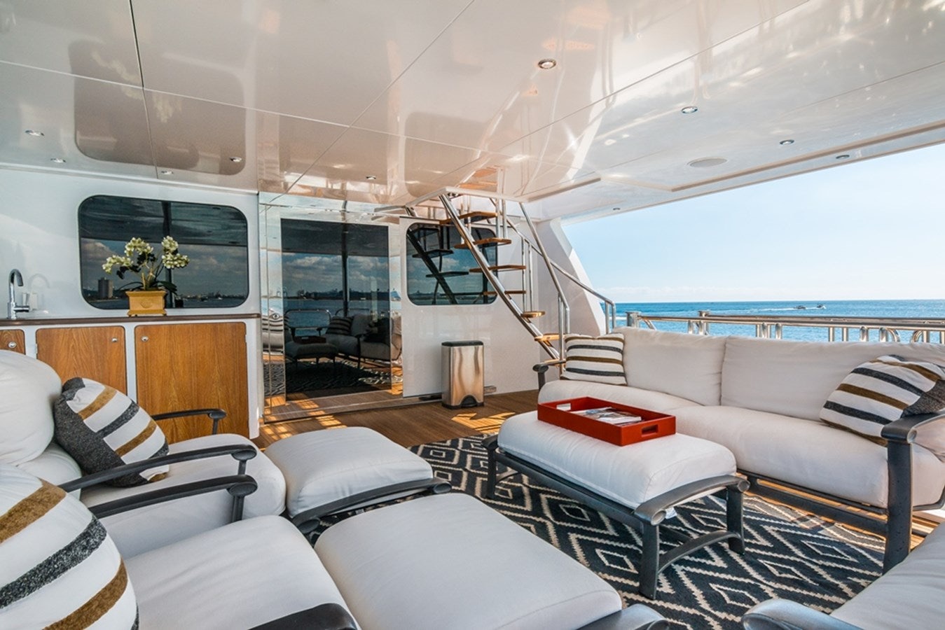 a living room with a large window aboard SEA CLASS Yacht for Sale