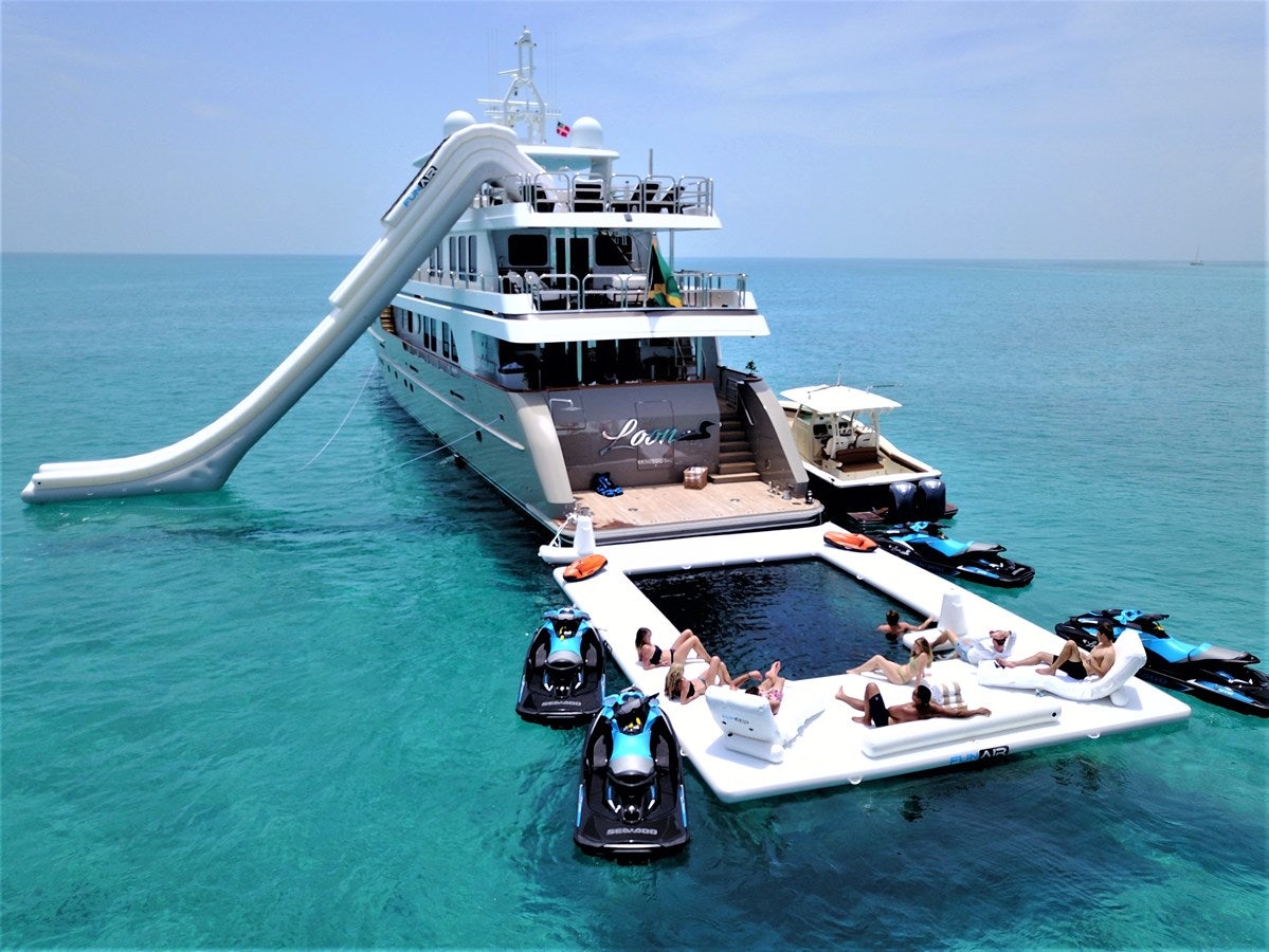 a boat carrying people on it aboard SEA CLASS Yacht for Sale