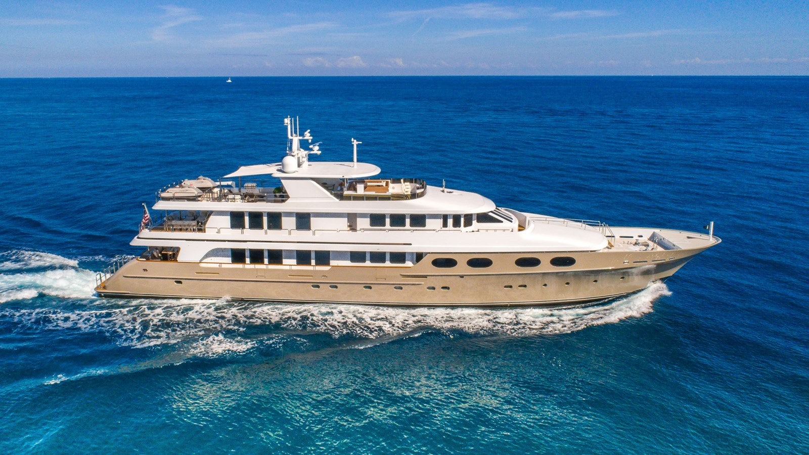 a white boat in the ocean aboard SEA CLASS Yacht for Sale