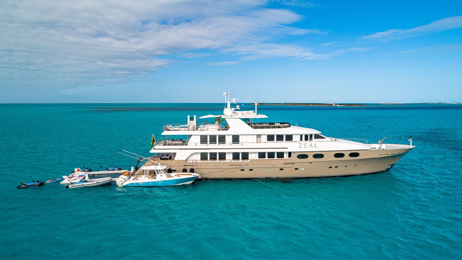 a large white boat in the water aboard SEA CLASS Yacht for Sale