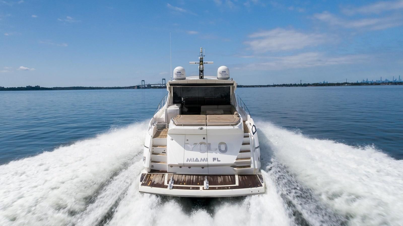 a boat on the water aboard YOLO Yacht for Sale