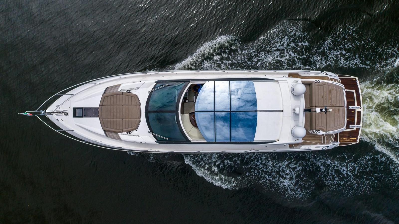 a pilot in a plane aboard YOLO Yacht for Sale