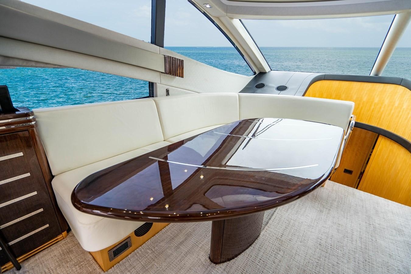 a lounge chair on a boat aboard YOLO Yacht for Sale
