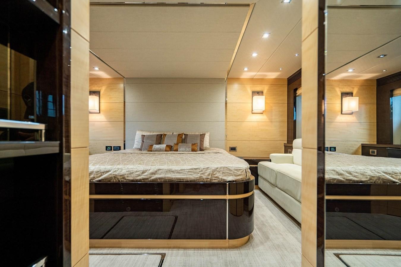 a room with two beds aboard YOLO Yacht for Sale