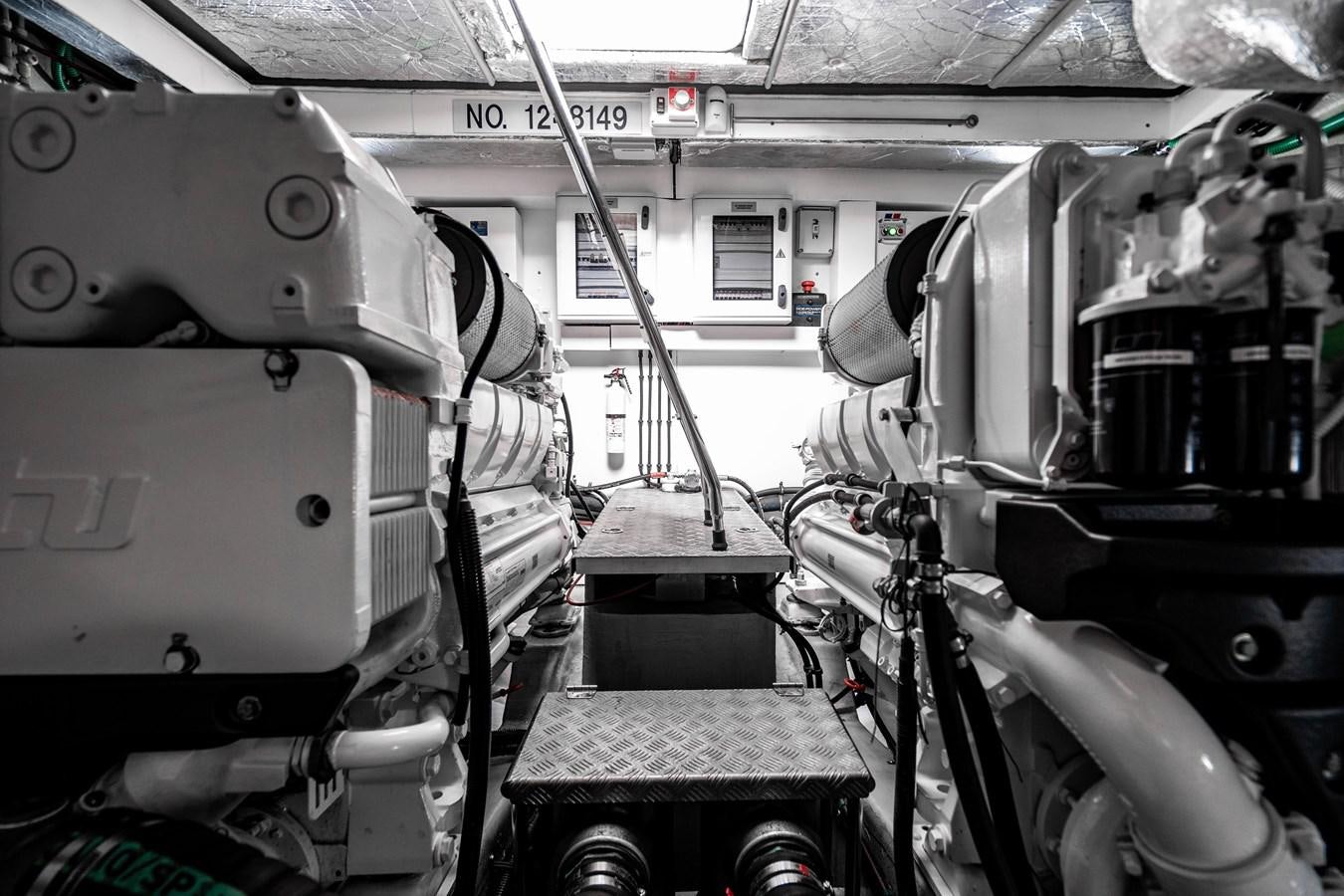 a machine inside a building aboard YOLO Yacht for Sale