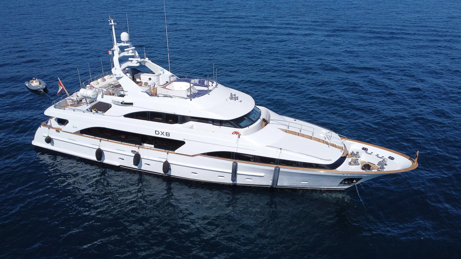 a white yacht in the water aboard DXB Yacht for Sale