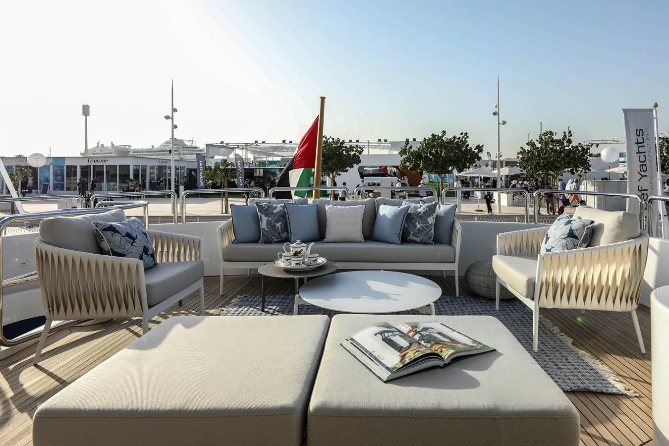 a living room with a large patio aboard DXB Yacht for Sale