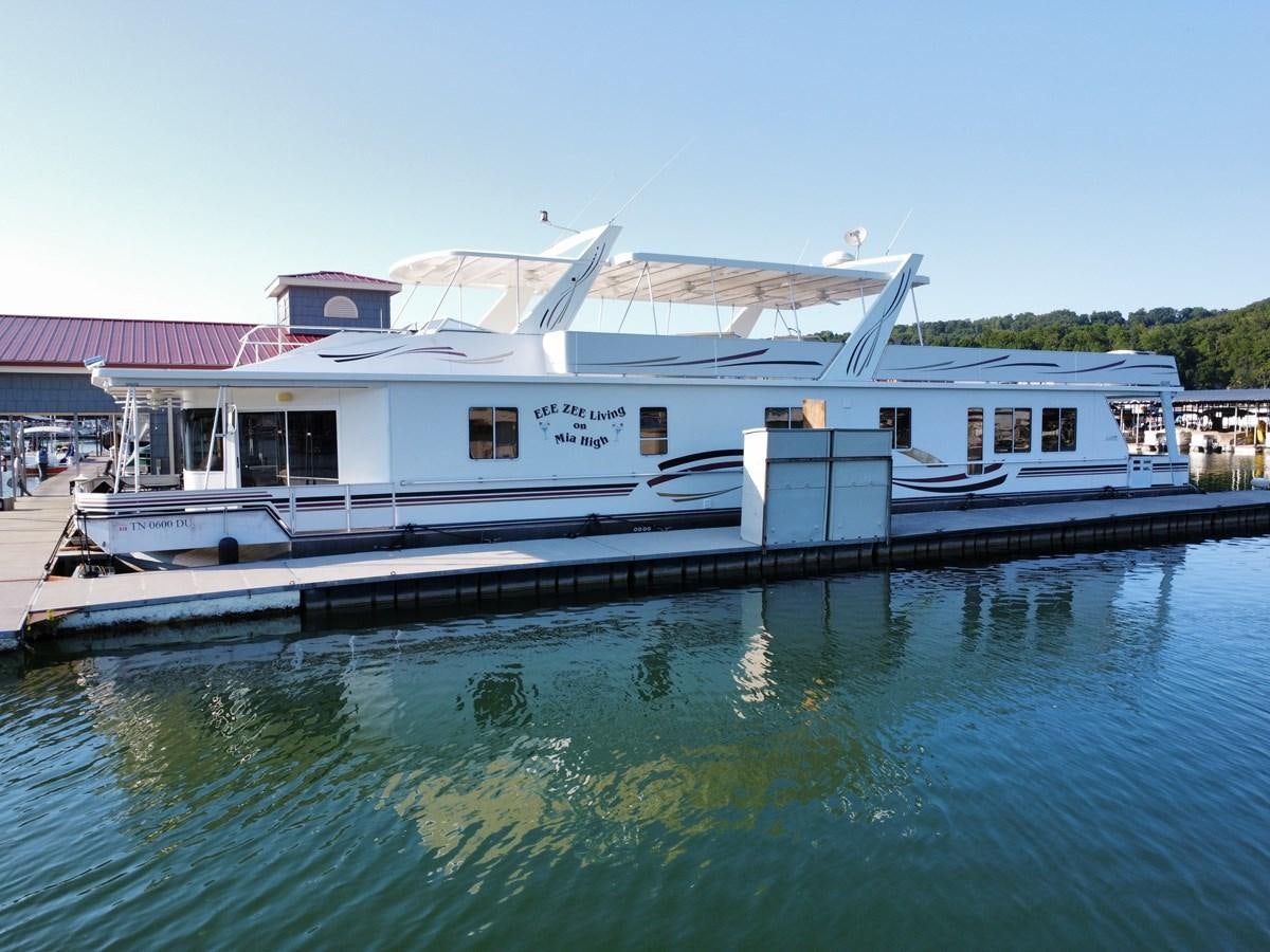 a boat docked at a pier aboard 2007 STARDUST 19 X 86WB NLCG Yacht for Sale