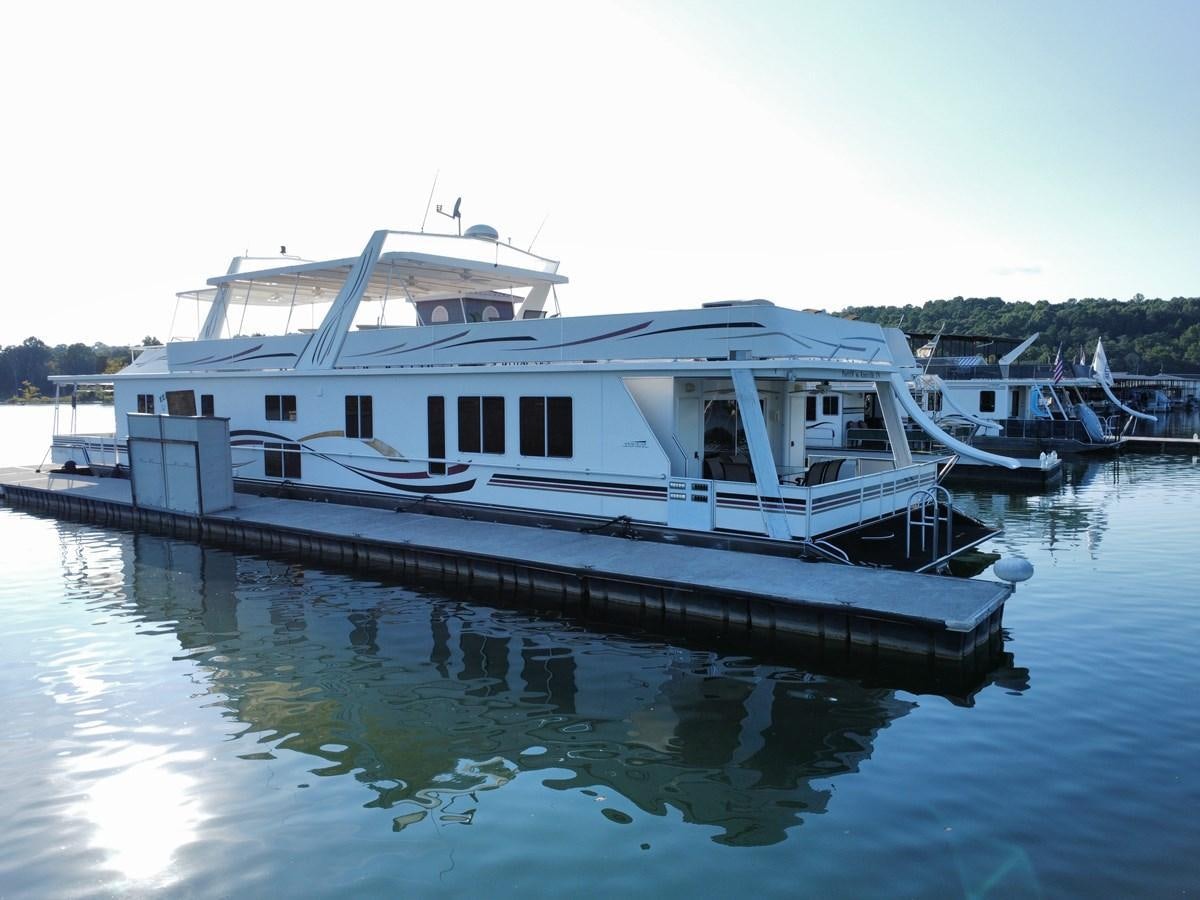 a boat docked at a pier aboard 2007 STARDUST 19 X 86WB NLCG Yacht for Sale