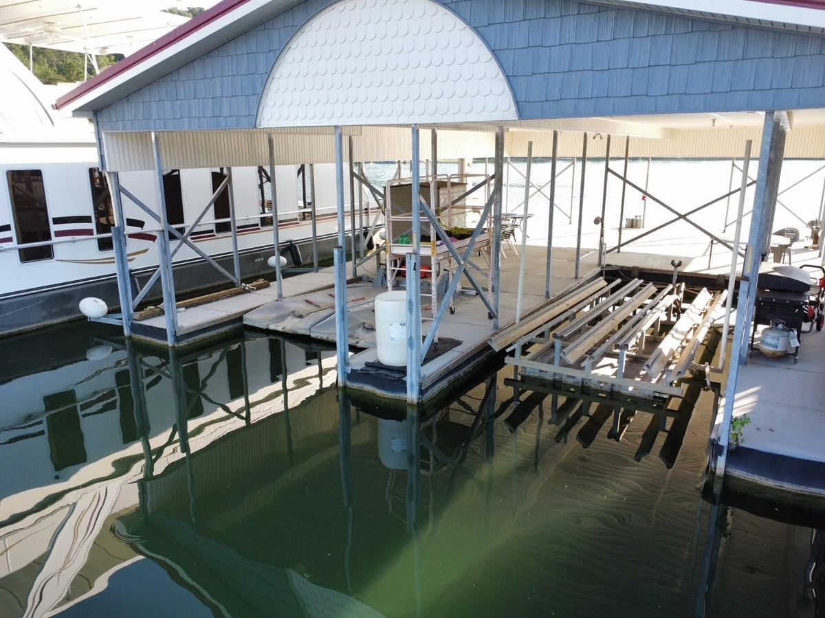 a boat docked in a harbor aboard 2007 STARDUST 19 X 86WB NLCG Yacht for Sale