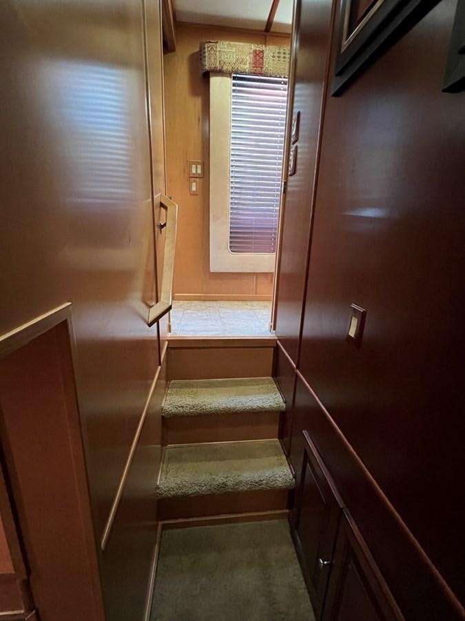 a door leading to a room aboard 2007 STARDUST 19 X 86WB NLCG Yacht for Sale