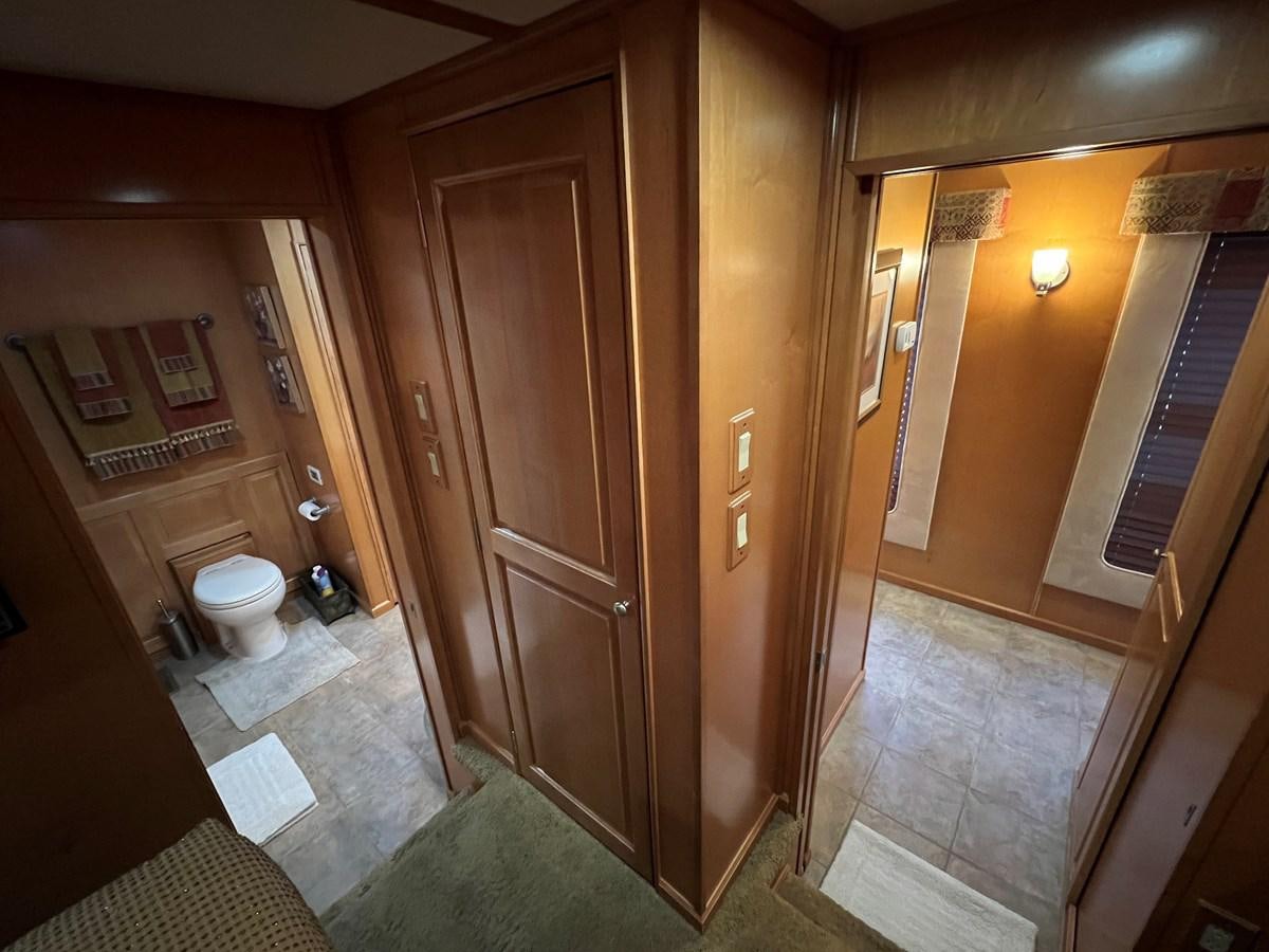 a bathroom with a toilet and a sink aboard 2007 STARDUST 19 X 86WB NLCG Yacht for Sale