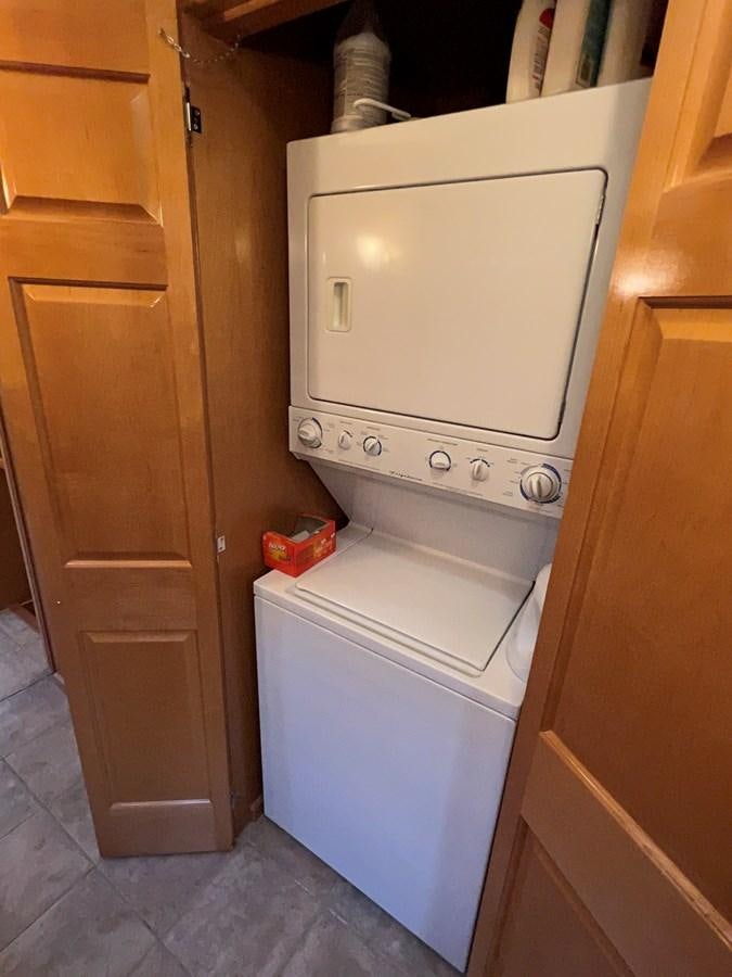 a white machine in a room aboard 2007 STARDUST 19 X 86WB NLCG Yacht for Sale