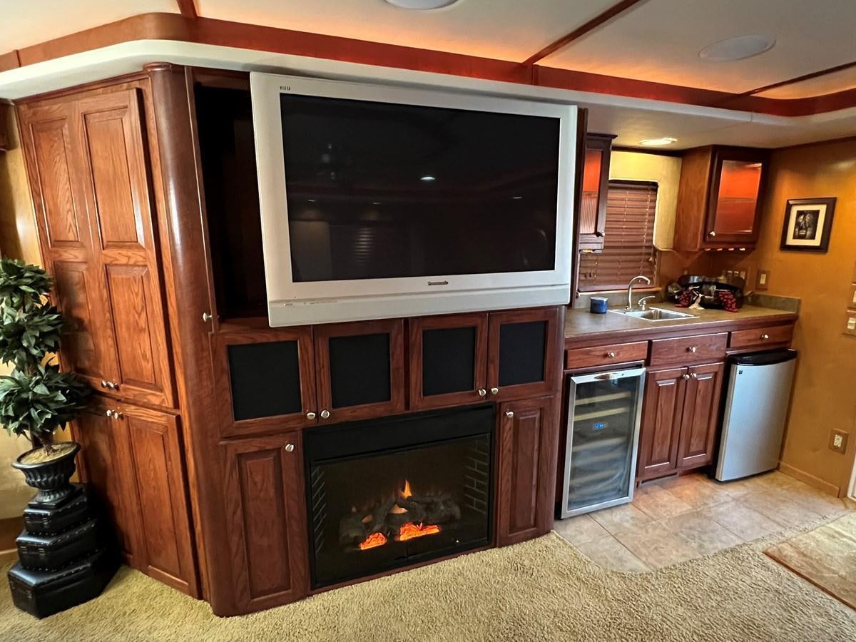 a fireplace in a kitchen aboard 2007 STARDUST 19 X 86WB NLCG Yacht for Sale