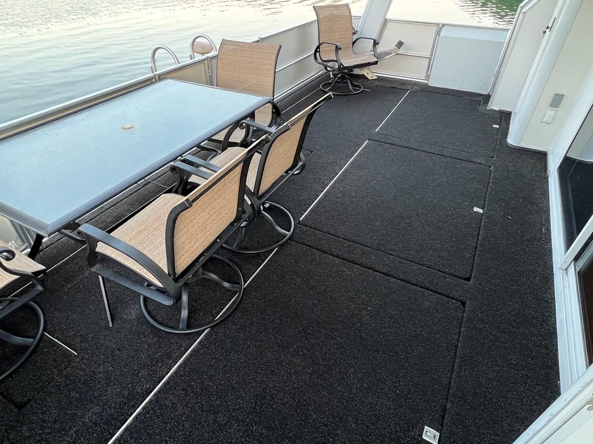 a pool table and chairs aboard 2007 STARDUST 19 X 86WB NLCG Yacht for Sale