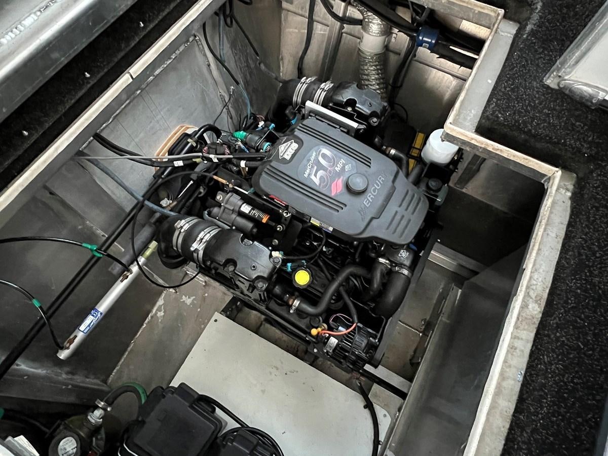 a car engine with wires aboard 2007 STARDUST 19 X 86WB NLCG Yacht for Sale
