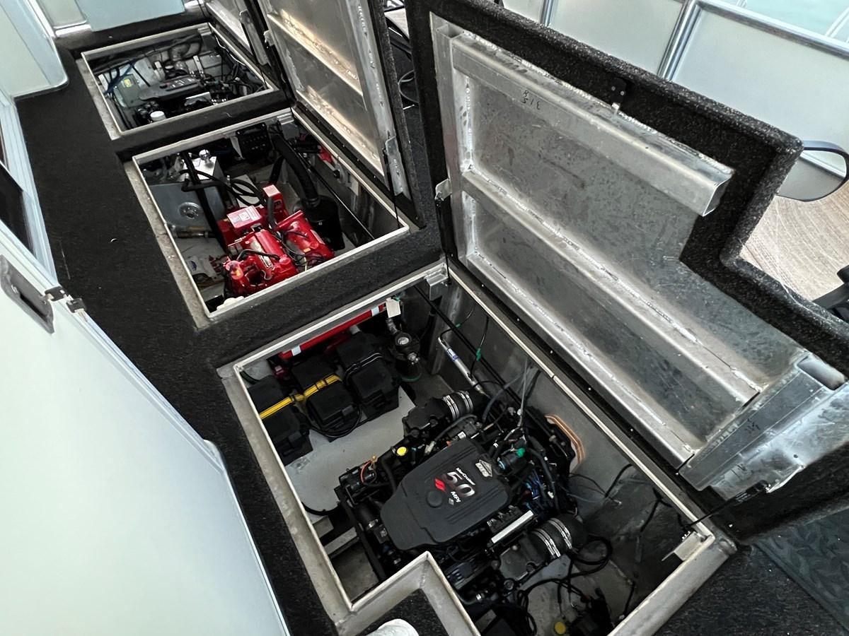 a car with its doors open aboard 2007 STARDUST 19 X 86WB NLCG Yacht for Sale