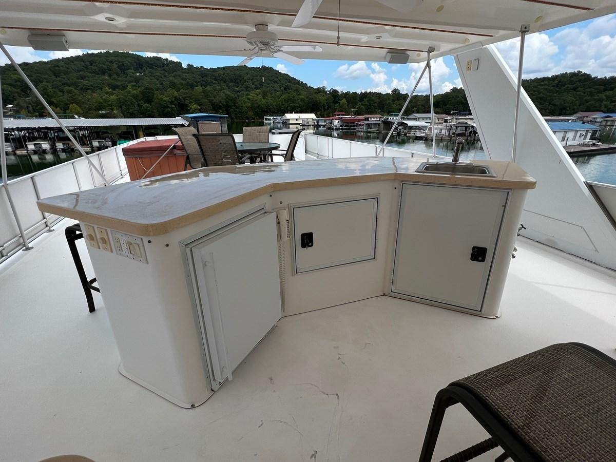 a white table on a boat aboard 2007 STARDUST 19 X 86WB NLCG Yacht for Sale