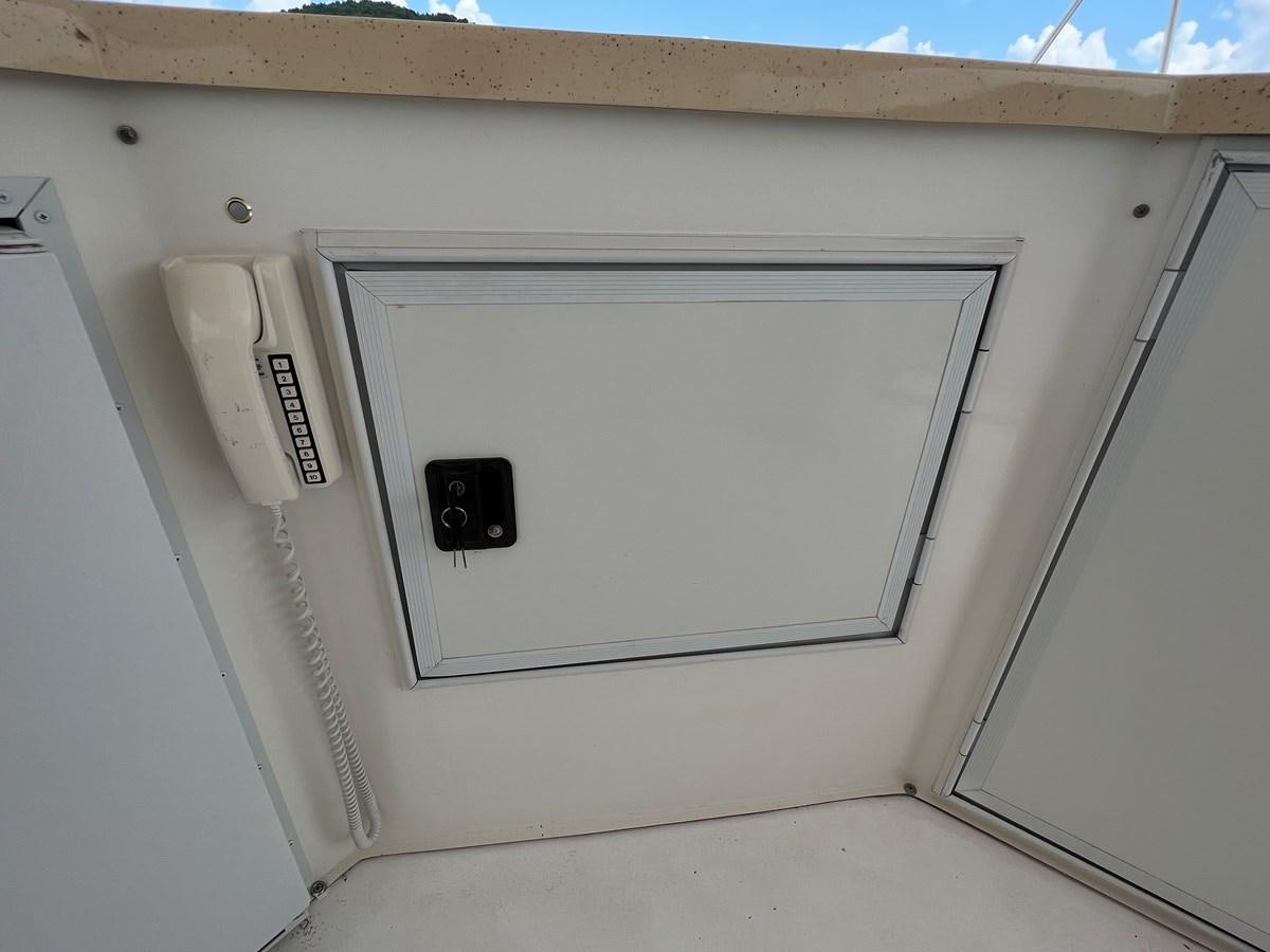 a white rectangular object with a silver switch aboard 2007 STARDUST 19 X 86WB NLCG Yacht for Sale