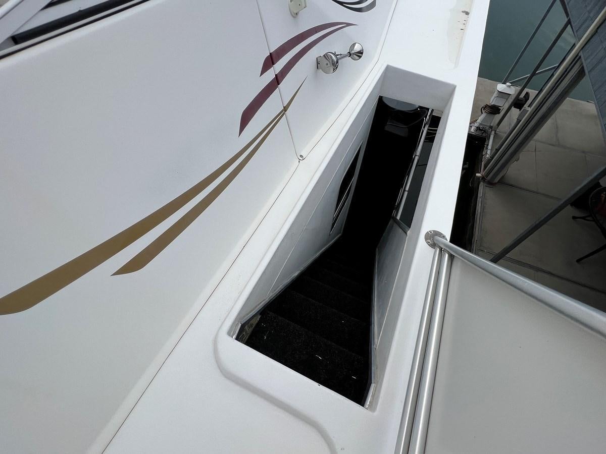a white door with a red ribbon aboard 2007 STARDUST 19 X 86WB NLCG Yacht for Sale