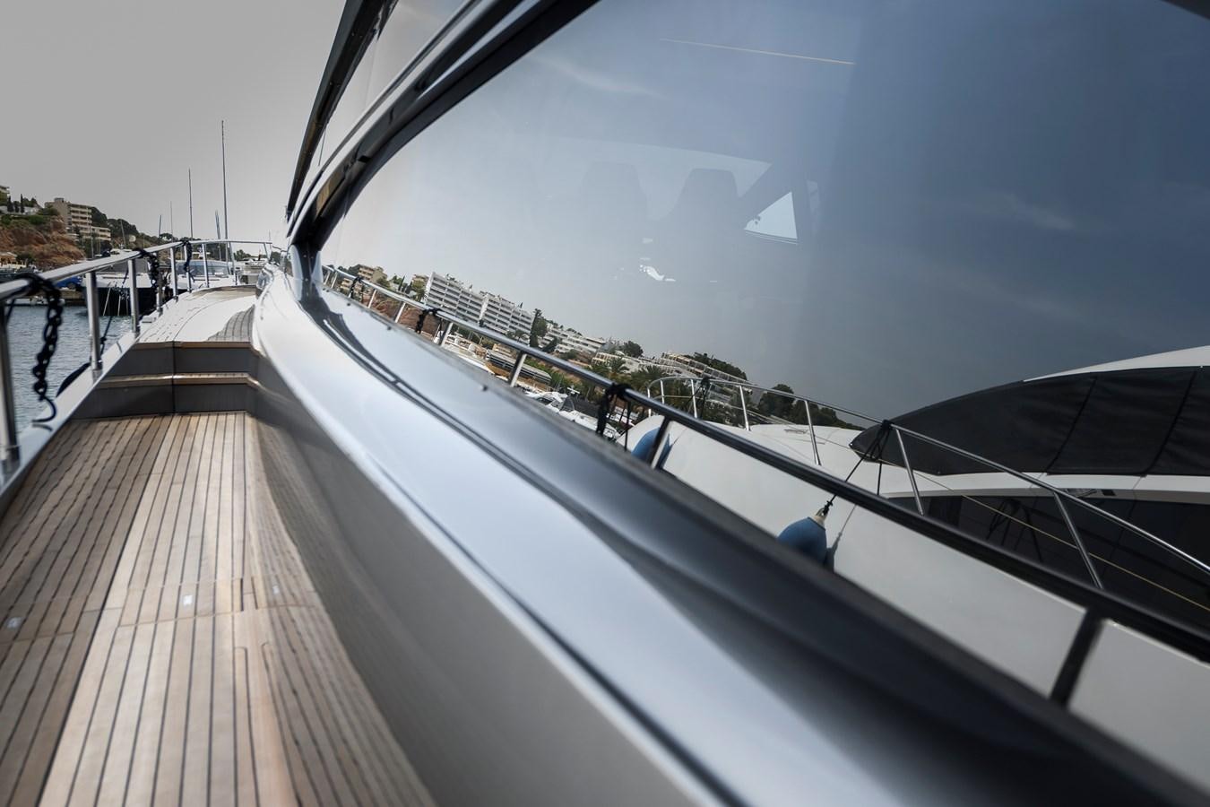 a deck with a large pool aboard CUCU Yacht for Sale