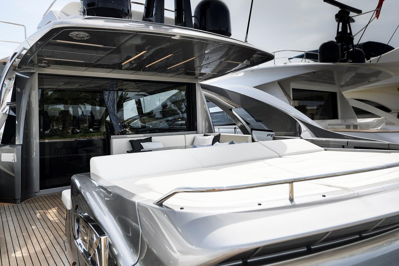 a white car with a large windshield aboard CUCU Yacht for Sale