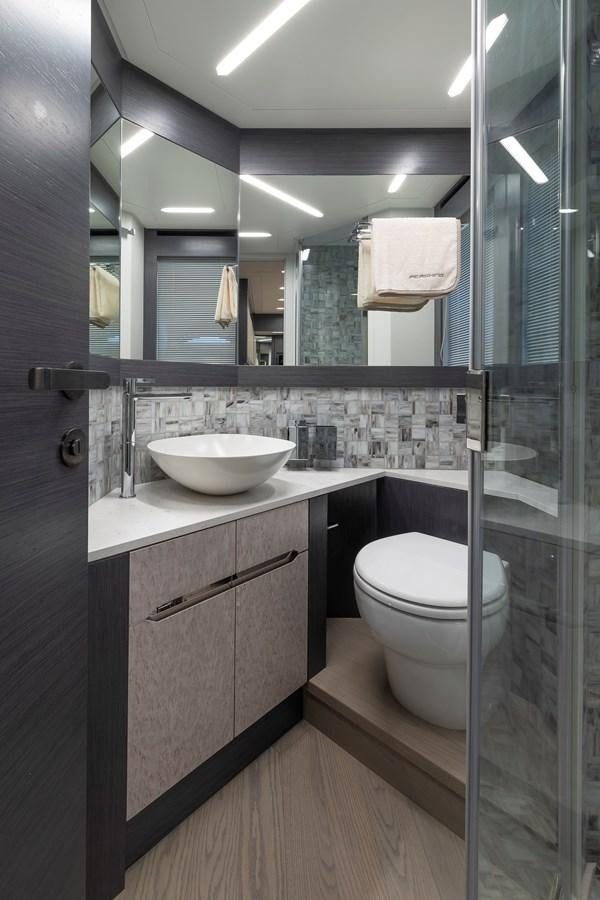 a bathroom with a sink and a toilet aboard CUCU Yacht for Sale