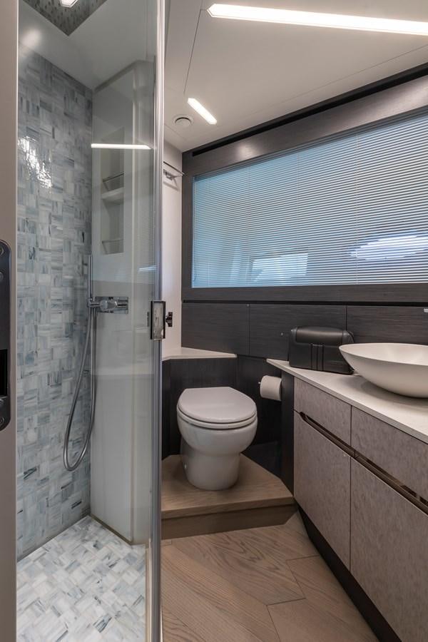 a bathroom with a sink toilet and a shower aboard CUCU Yacht for Sale