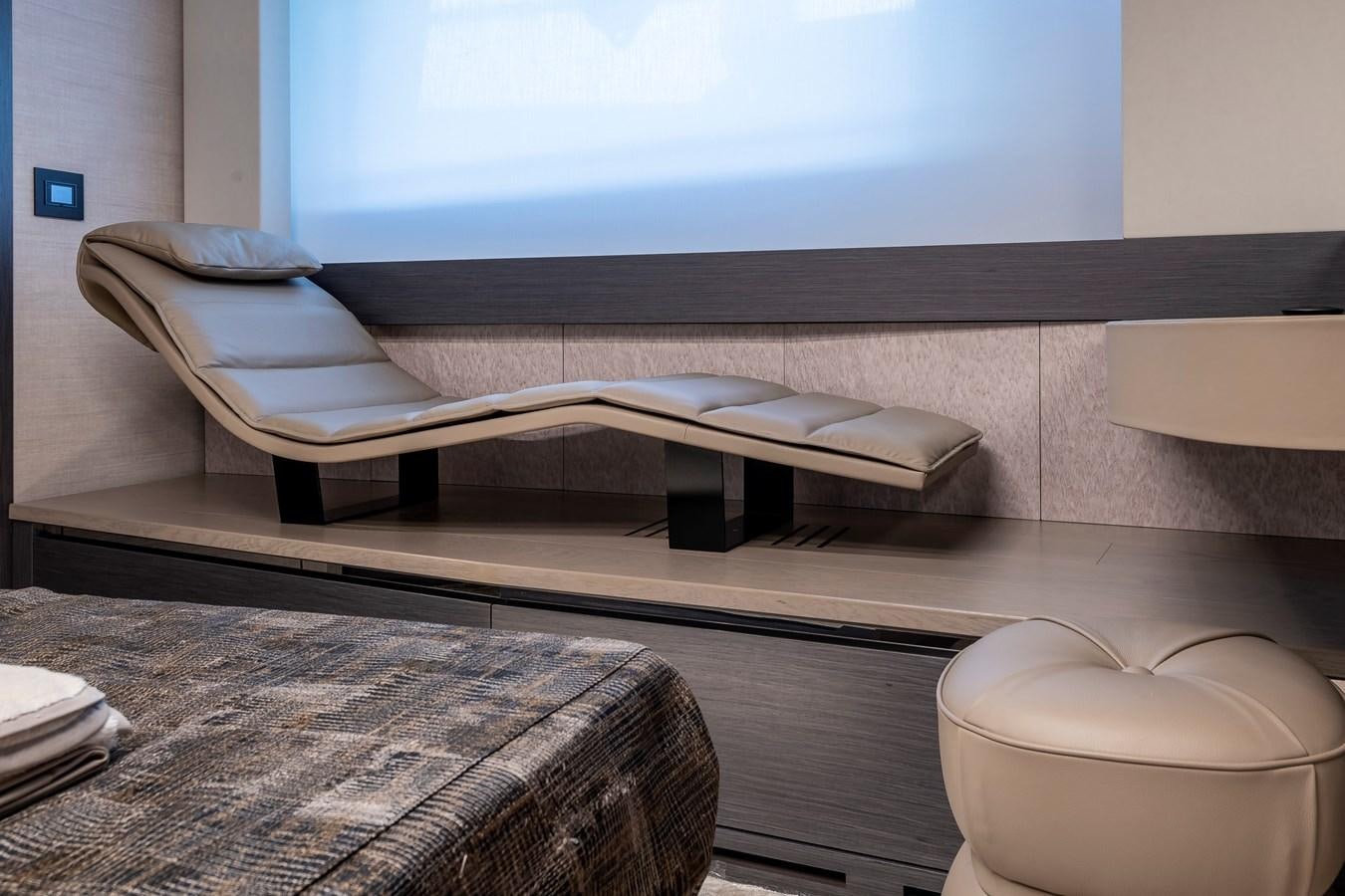 a white rectangular object on a wooden surface aboard CUCU Yacht for Sale