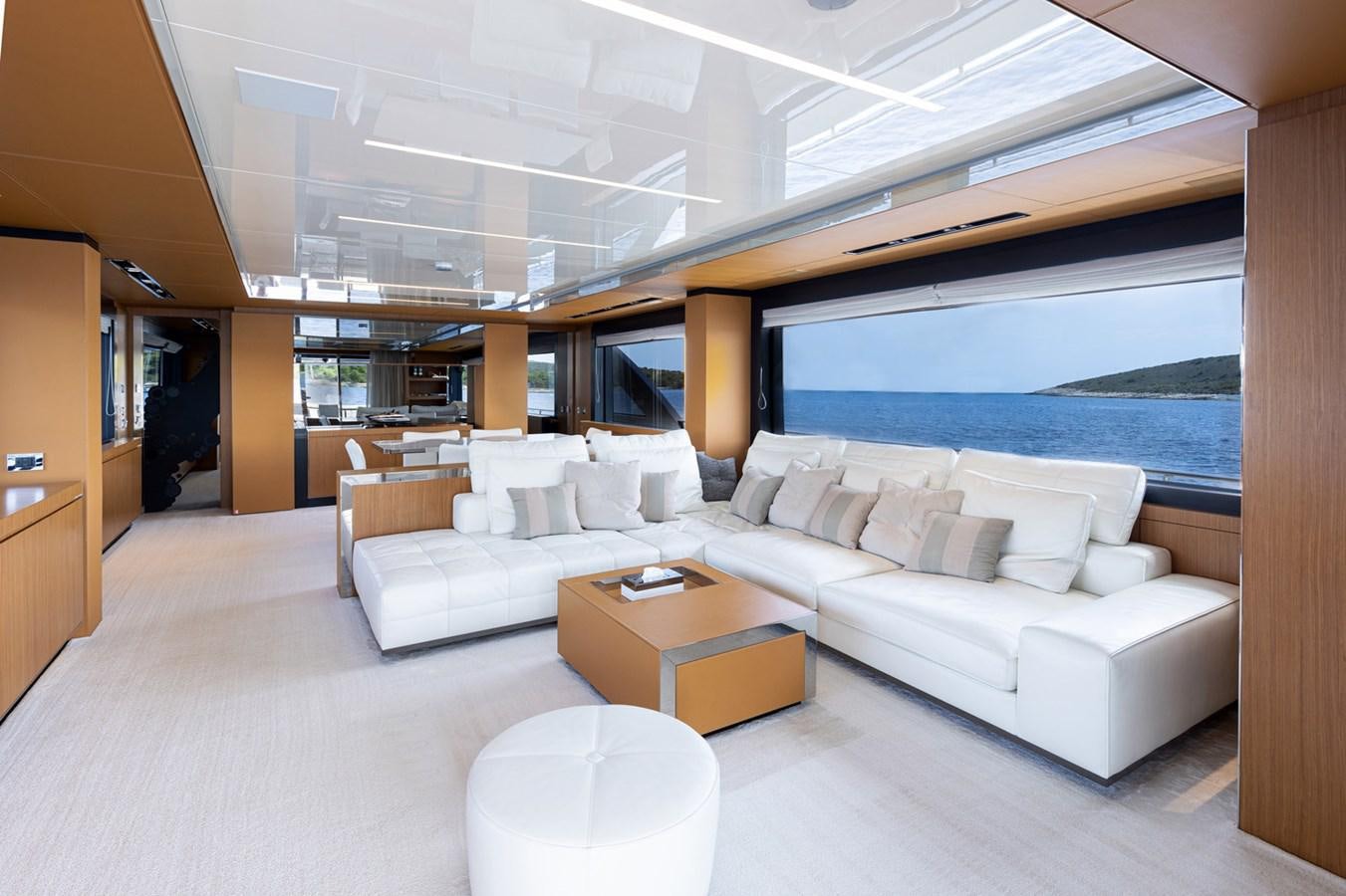 a living room with a large window aboard NO STRESS 888 Yacht for Sale