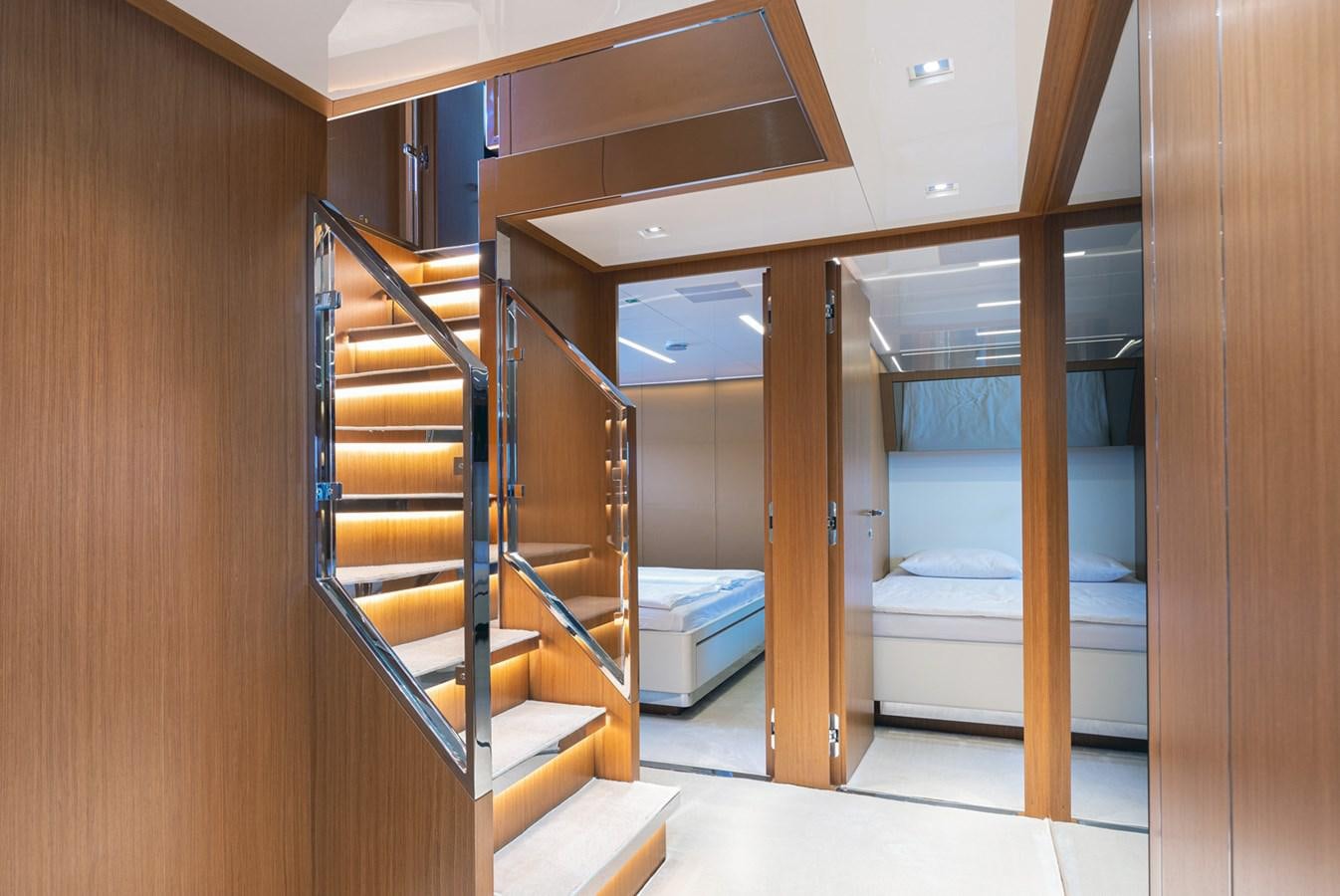 a wooden bunk bed in a room aboard NO STRESS 888 Yacht for Sale